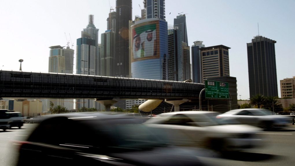 Cars drive on Sheikh Zayed's highway in Dubai