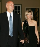 In this Nov. 3, 2005 file photo, former baseball player Cal Ripken and his wife Kelly arrive at a gala reception at the British Embassy in Washington. (Alastair Grant)