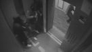 A number of suspected gang members are shown exchanging gunfire inside a Front Street condo building in this image taken from surveillance camera footage. 