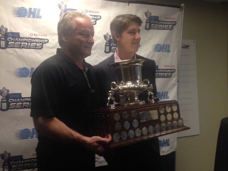 Mitch Marner (right) poses with his new hardware in London, Ont., on Tuesday, May 3, 2016. (Brent Lale / CTV London)