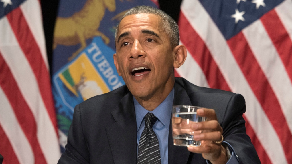 President Barack Obama drinks water in Flint, Mich