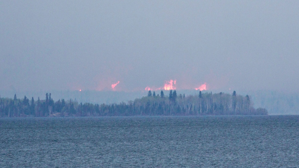 Wildfires burn across Gregoire Lake
