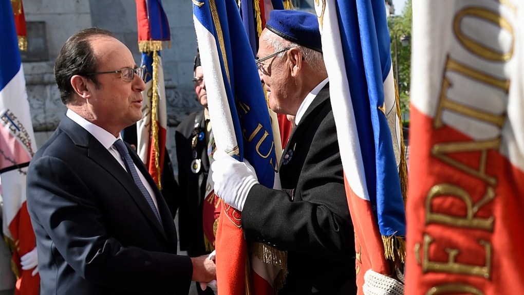Francois Hollande celebrates Victory day in France