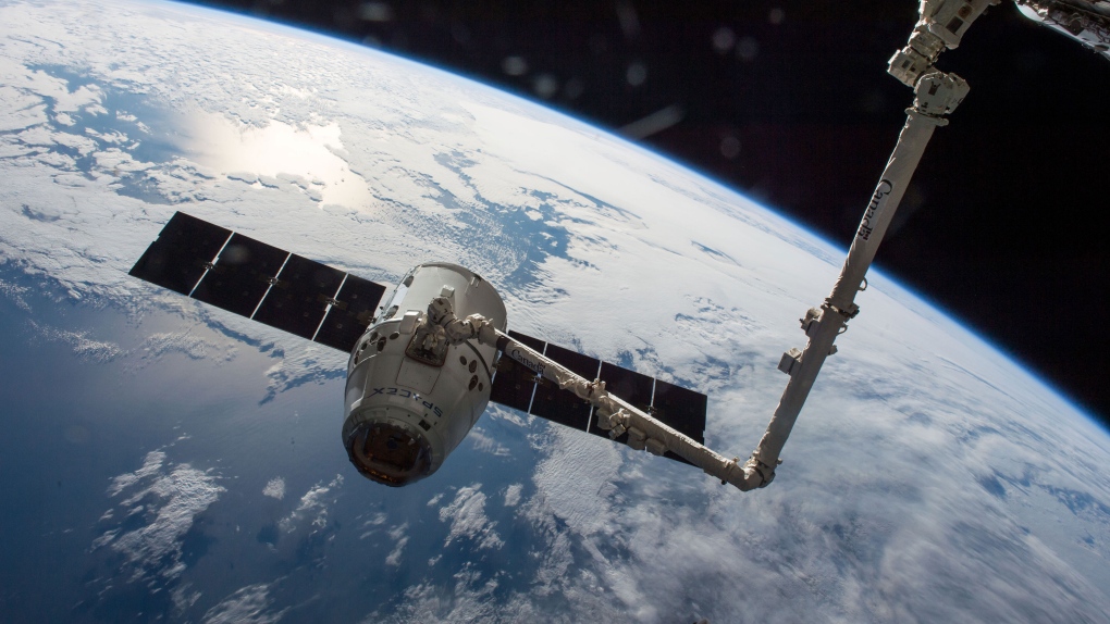 Canadarm2 and a SpaceXDragon cargo module