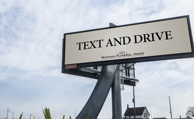'Text and drive' funeral home billboard ad 