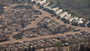 A devastated neighbourhood in Fort McMurray, Alta., is shown on Friday, May 13, 2016. THE CANADIAN PRESS/Jason Franson