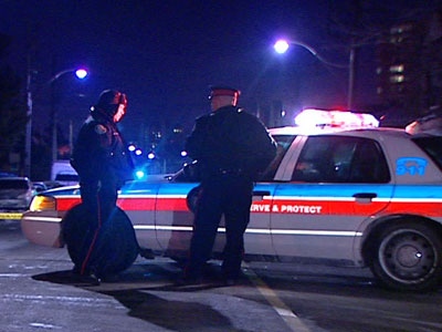 Toronto Police tend to the scene of a fatal stabbing on Davenport Road, Saturday, Jan. 17, 2009.