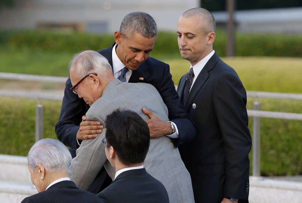 U.S. President Barack Obama hugs Shigeaki Mori