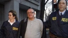 Rocco Sollecito is brought into court in 2006.