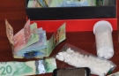 London Police seize drugs and cash in two different drug bust in northeast London on Friday, June 3rd, 2016.