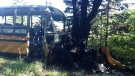 School bus damaged by fire in crash Monday morning