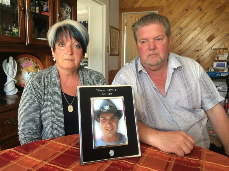 Don and Marlene Affleck display a picture of their son Wayne Affleck on Wednesday, June 8, 2016. (Michelle Maluske / CTV Windsor)
