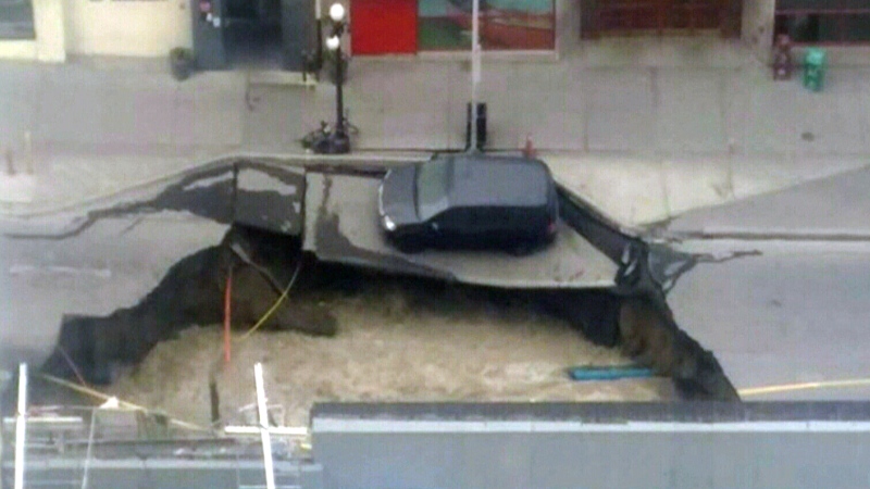 Extended: Sinkhole swallows up van