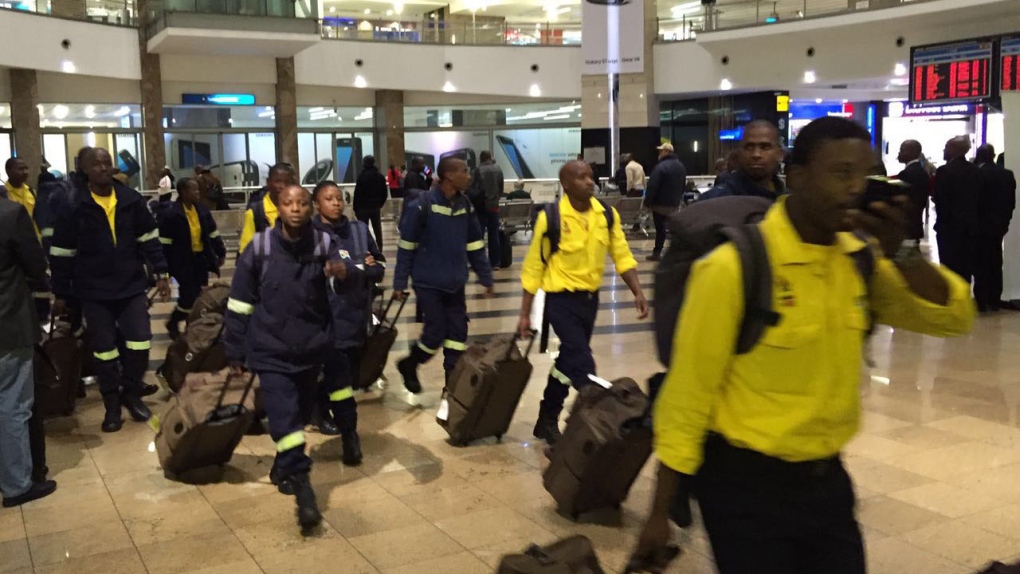 South African firefighters return home