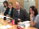 Mayor Matt Brown and then-Deputy Mayor Maureen Cassidy at a poverty panel event in London in February, 2016.