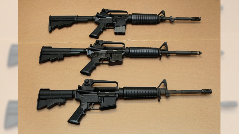 In this Aug. 15, 2012 photo, three variations of the AR-15 assault rifle are displayed at the California Department of Justice in Sacramento, Calif. (AP / Rich Pedroncelli)