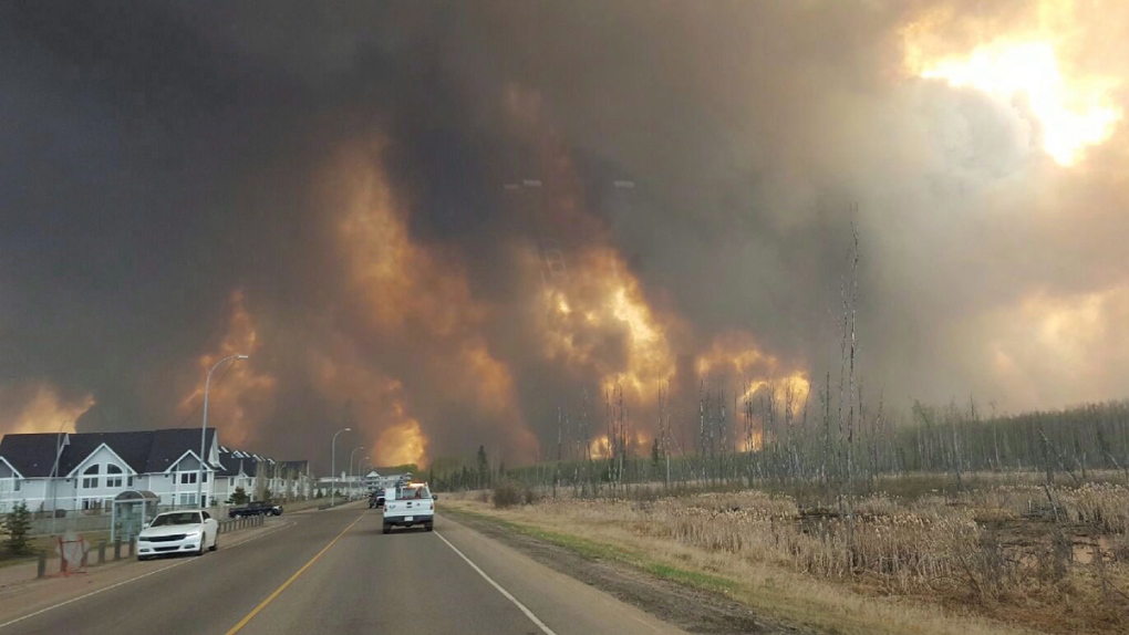 Fire rages outside of Fort McMurray on May 3, 2016