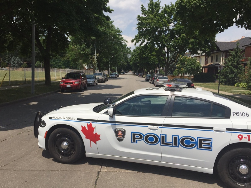 Police investigate a possible 'violent altercation' at Wyandotte Street East and Monmouth in Windsor, Ont., on Wednesday, June 22, 2016. (Sacha Long / CTV Windsor)