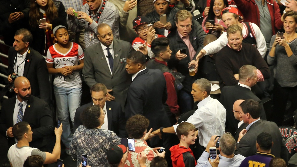 President Barack Obama greets NBA fans 