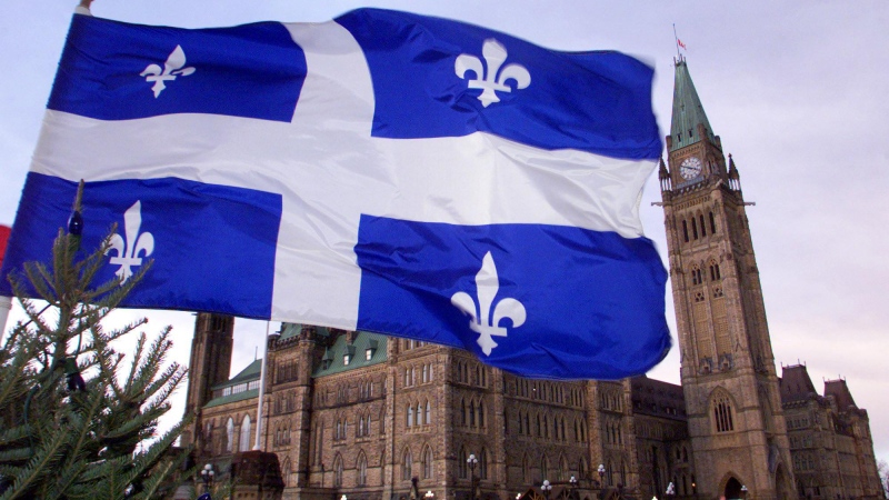 The flag of Quebec flies in this undated file photo. (Tom Hanson/The Canadian Press)