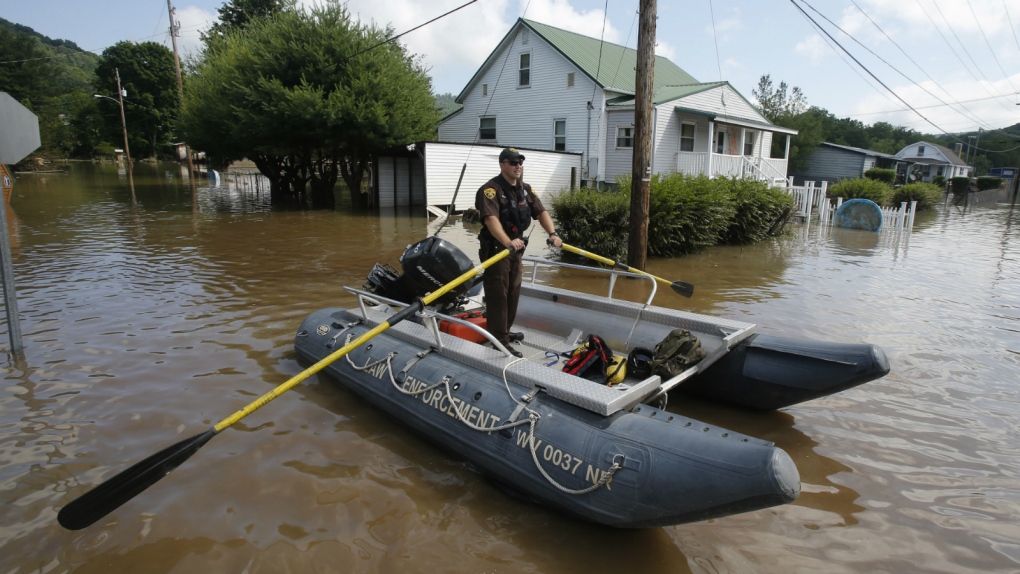 Rescue crews examine flood homes in West Virginia