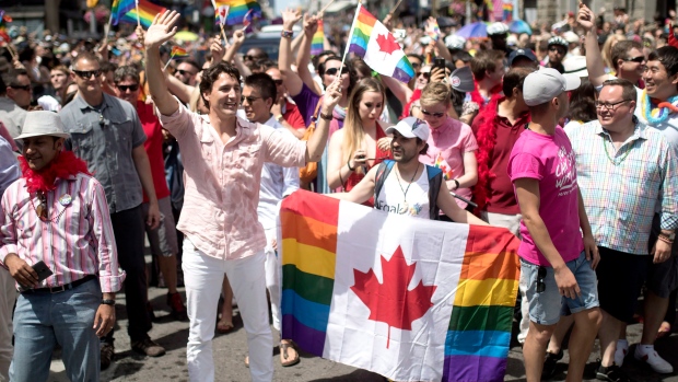 PM Trudeau marches with Bassel Mcleash in Pride