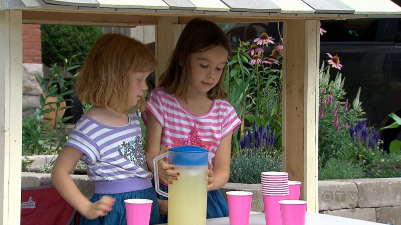 Adela & Eliza Andrews will be selling lemonade again this summer, their dad Kurtis says. (Photo courtesy of Kurtis Andrews)