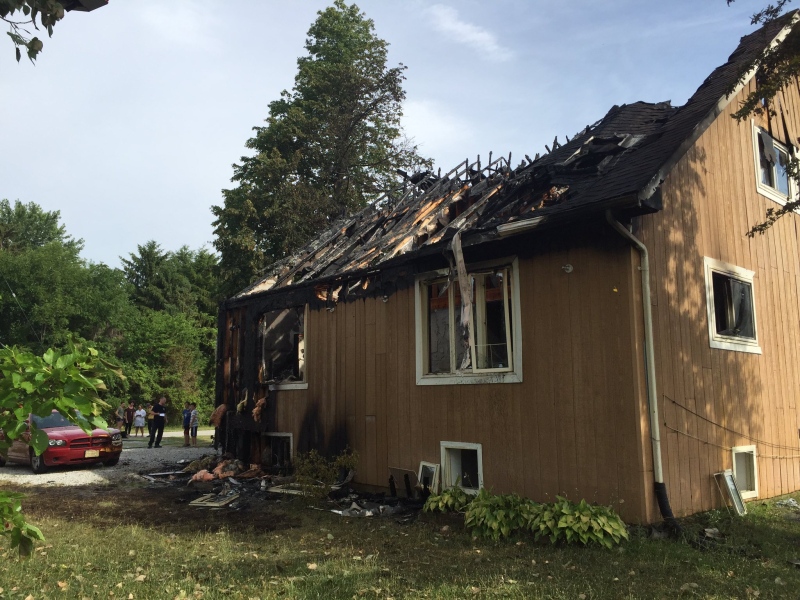 A home was badly damaged by fire in LaSalle, Ont., on Wednesday, July 6, 2016. (Sacha Long / CTV Windsor)