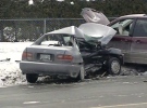A woman is dead after her car collided with a minivan in Ottawa's east end, Monday, Jan. 26, 2009.