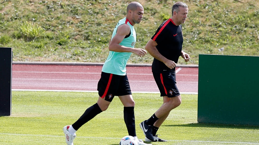 Portugal's Pepe trains with physiotherapist 