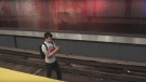 A man appears to walk on the TTC subway tracks in a YouTube video about Pokemon Go. (YouTube/Noodle Boys) 