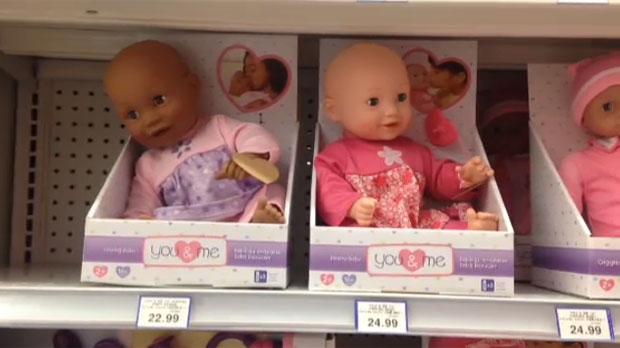 Black and white dolls priced differently
