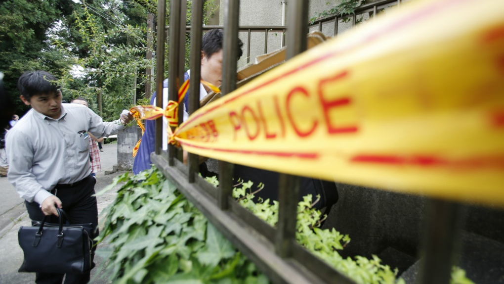 Police enter home of Japan stabbing suspect