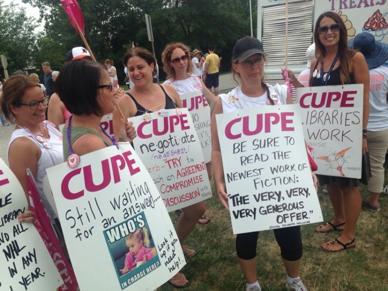 Striking library workers rally at Essex Library in Essex, Ont., on Thursday, July 28, 2016. (Rich Garton / CTV Windsor)