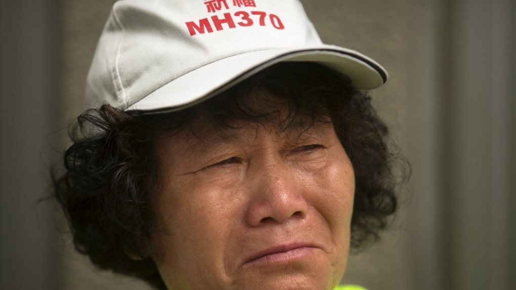 Relatives of MH370 passengers protest in China