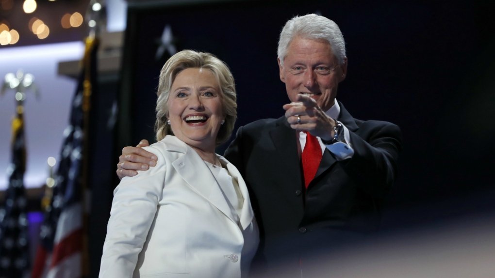 Hillary and Bill Clinton on stage