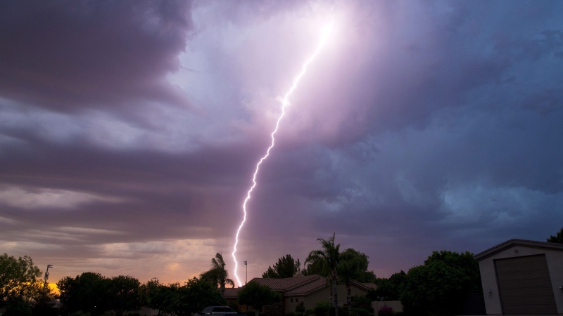 Lightning strikes east Mesa, Ariz., Friday, July 29, 2016. (Michael Chow/The Arizona Republic via AP)