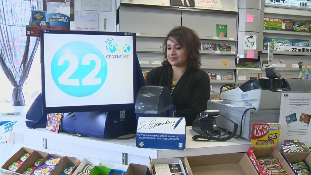 A woman stands behind a Loto Quebec counter