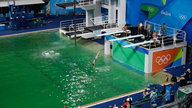 The water of the diving pool appears a murky green
