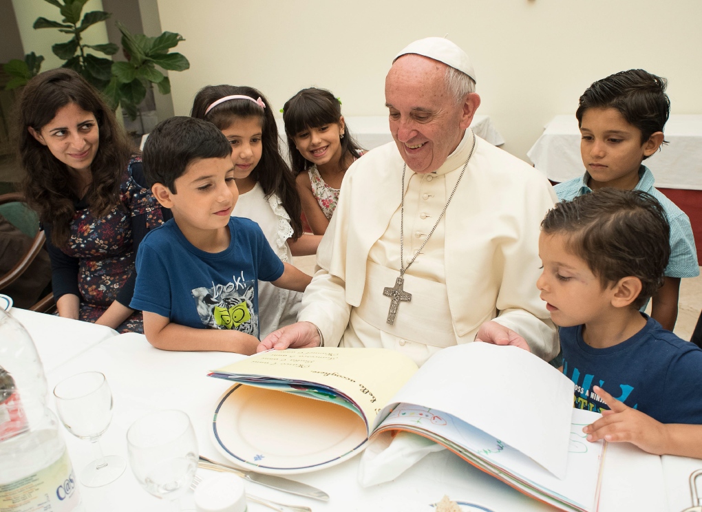 Pope meets refugees