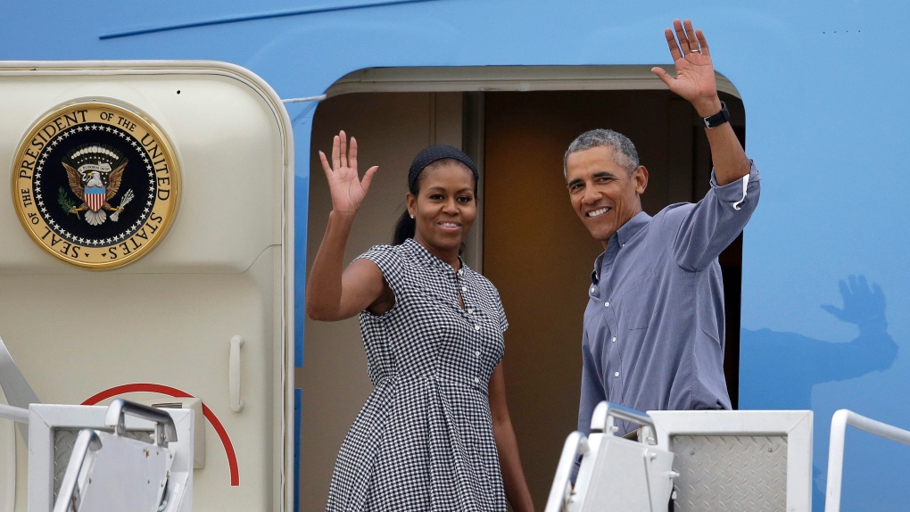 U.S. President Barack Obama returns from vacation