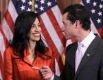In this file photo taken Jan. 5, 2011, then-New York Rep. Anthony Weiner and his now ex-wife, Huma Abedin, are pictured on Capitol Hill in Washington. (AP / Charles Dharapak)