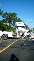 A head-on crash between a pickup truck and a transport truck on Highway 3 in Kingsville, Ont., on Thursday, Sept.1, 2016. (Courtesy OPP)