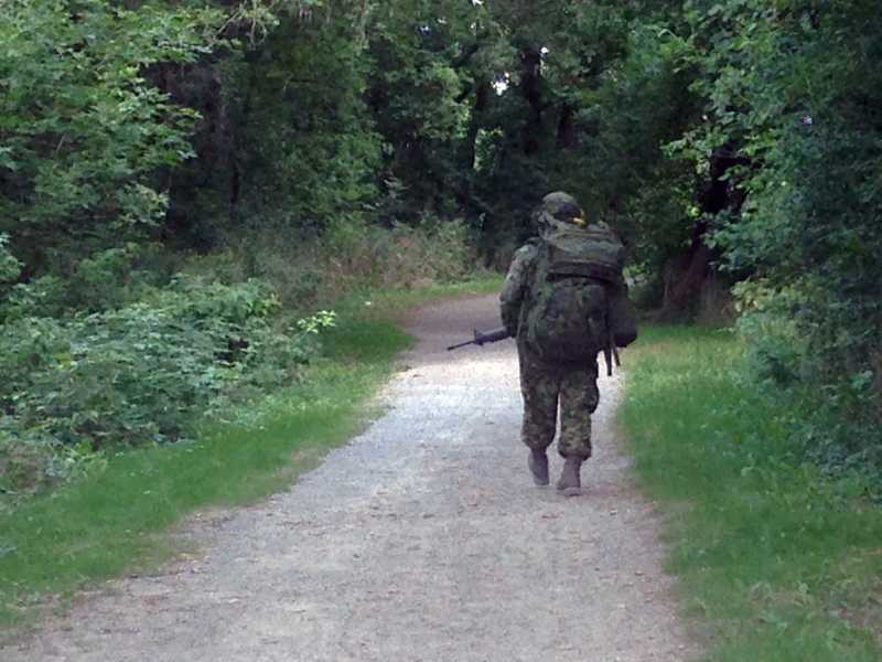 A soldier walks on a section of the Cambridge-to-Paris Rail Trail during a training exercise on Tuesday, Sept. 6, 2016. (Max Wark / CTV Kitchener)