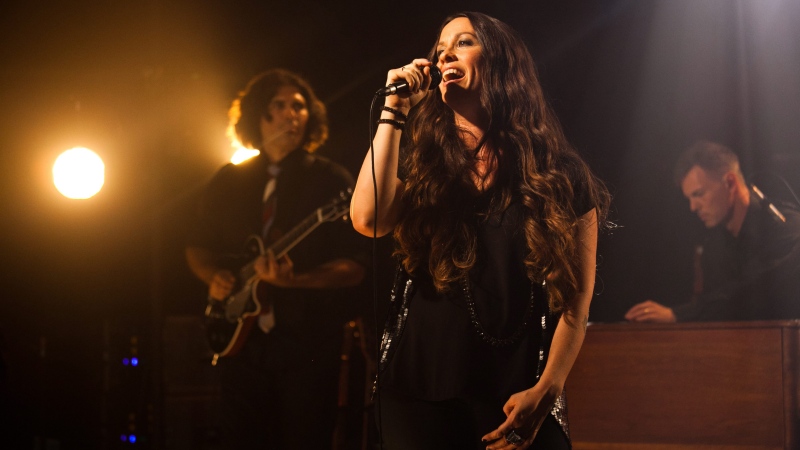 This Tuesday, Aug. 28, 2012 photo released by iHeartRadio shows Alanis Morissette performing at an iHeartRadio Live show in New York. (AP Photo / iHeartRadio, Jeremy Harris)