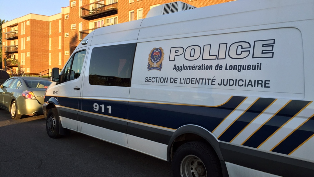 A Longueuil police van parked on Rivoli St. in Lon