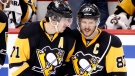 Pittsburgh Penguins' Sidney Crosby, right, and Evgeni Malkin talk as they return to the ice after a stop in play during the third period of Game 6 of the NHL hockey Stanley Cup Eastern Conference semifinals against the Washington Capitals in Pittsburgh on May 10, 2016. (AP Photo/Gene J. Puskar, File)