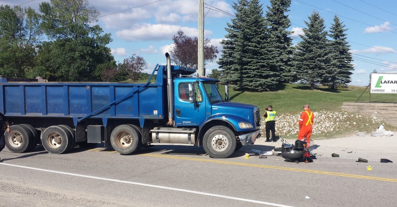 A 61-year-old Kitchener woman was killed when her motorcycle and a dump truck collided on Dumfries Road in North Dumfries. (Dan Lauckner / CTV Kitchener)