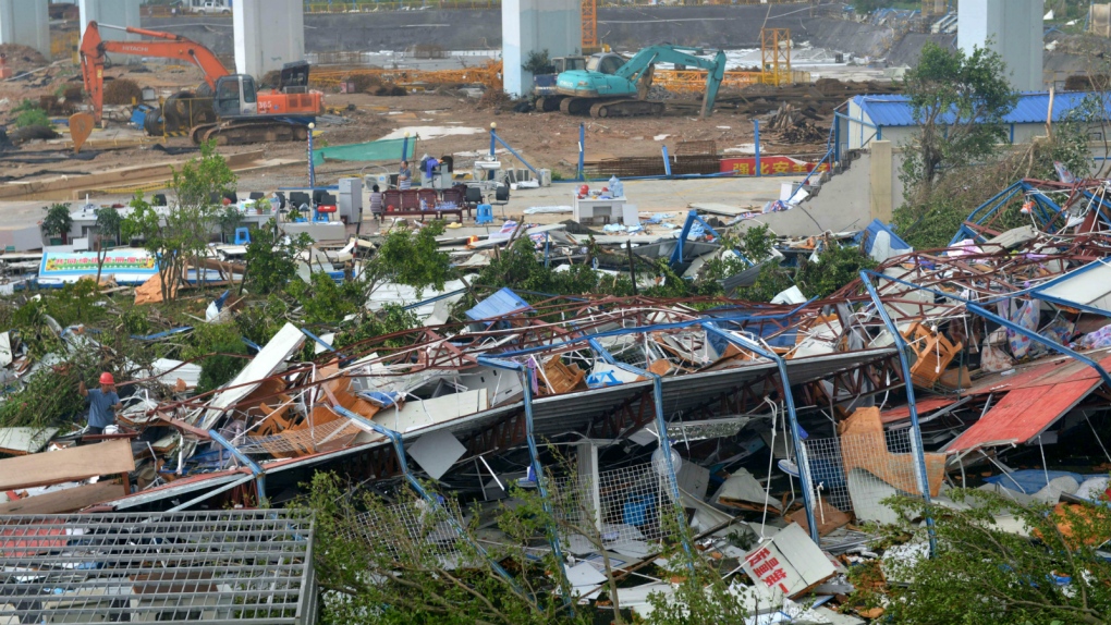 Residents survey damage from Typhoon Meranti