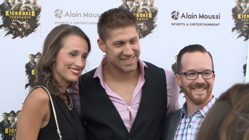 Newly-minted action star, Alain Moussi, poses with fans at his movie premiere in Ottawa, Sep. 16, 2016